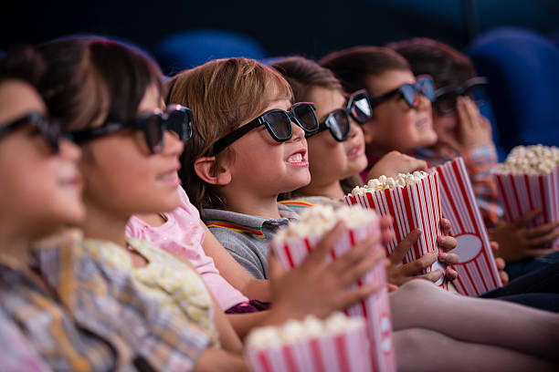 children at the cinema watching a 3D movie