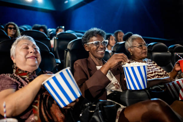happy senior women at the cinema