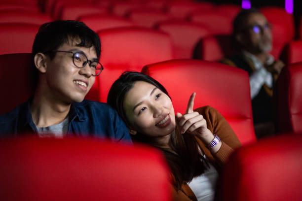 young couple watching a movie